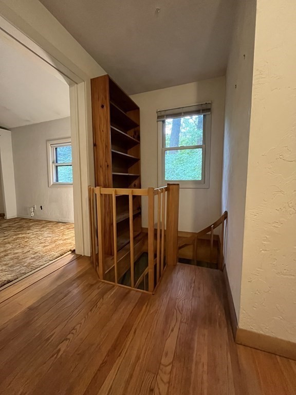 6 New Street Billerica, MA 01821 - Photo 13 of 17 wooden floor in an empty room with a window