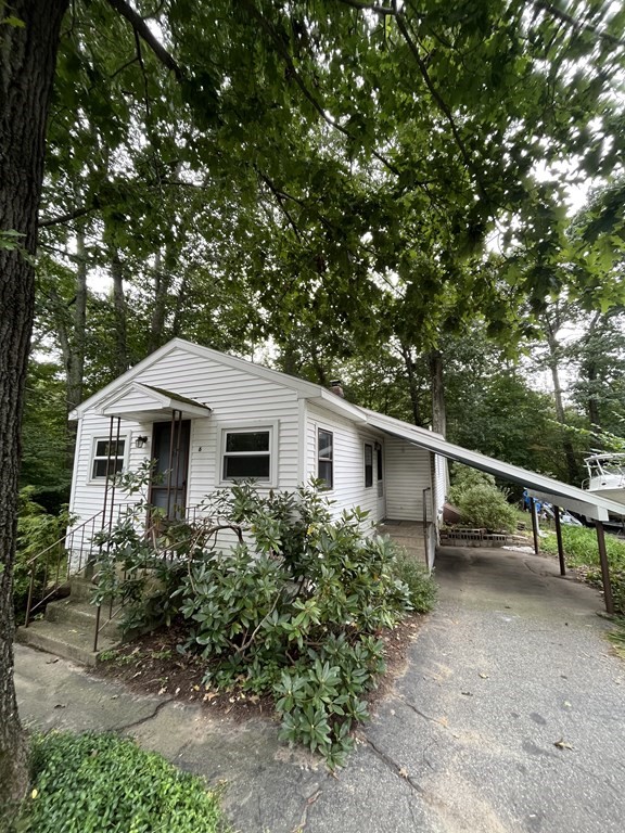 6 New Street Billerica, MA 01821 - Photo 3 of 17 a house view with a garden space