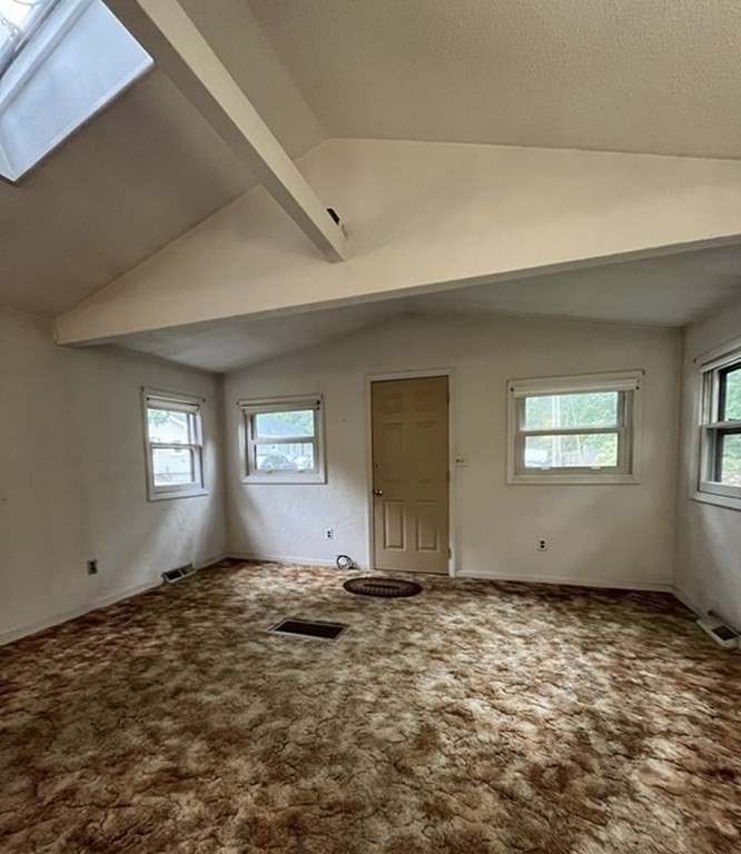 6 New Street Billerica, MA 01821 - Photo 7 of 17 a view of wooden floor and windows in a room