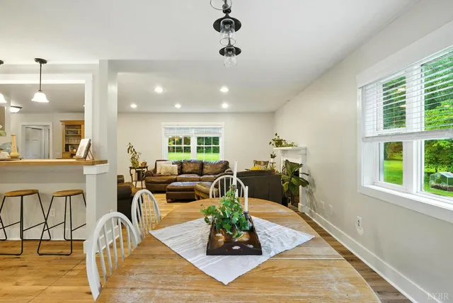 a living room with furniture or window and a wooden floor