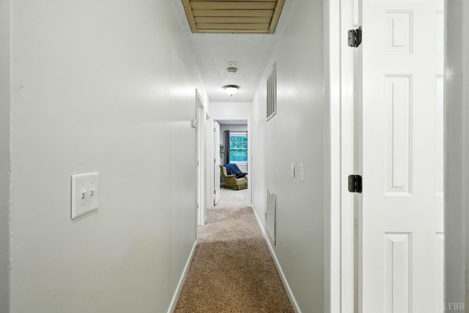 2078 Featherfin Road Prospect, VA 23960 - Photo 19 of 49 a view of a hallway with wooden floor