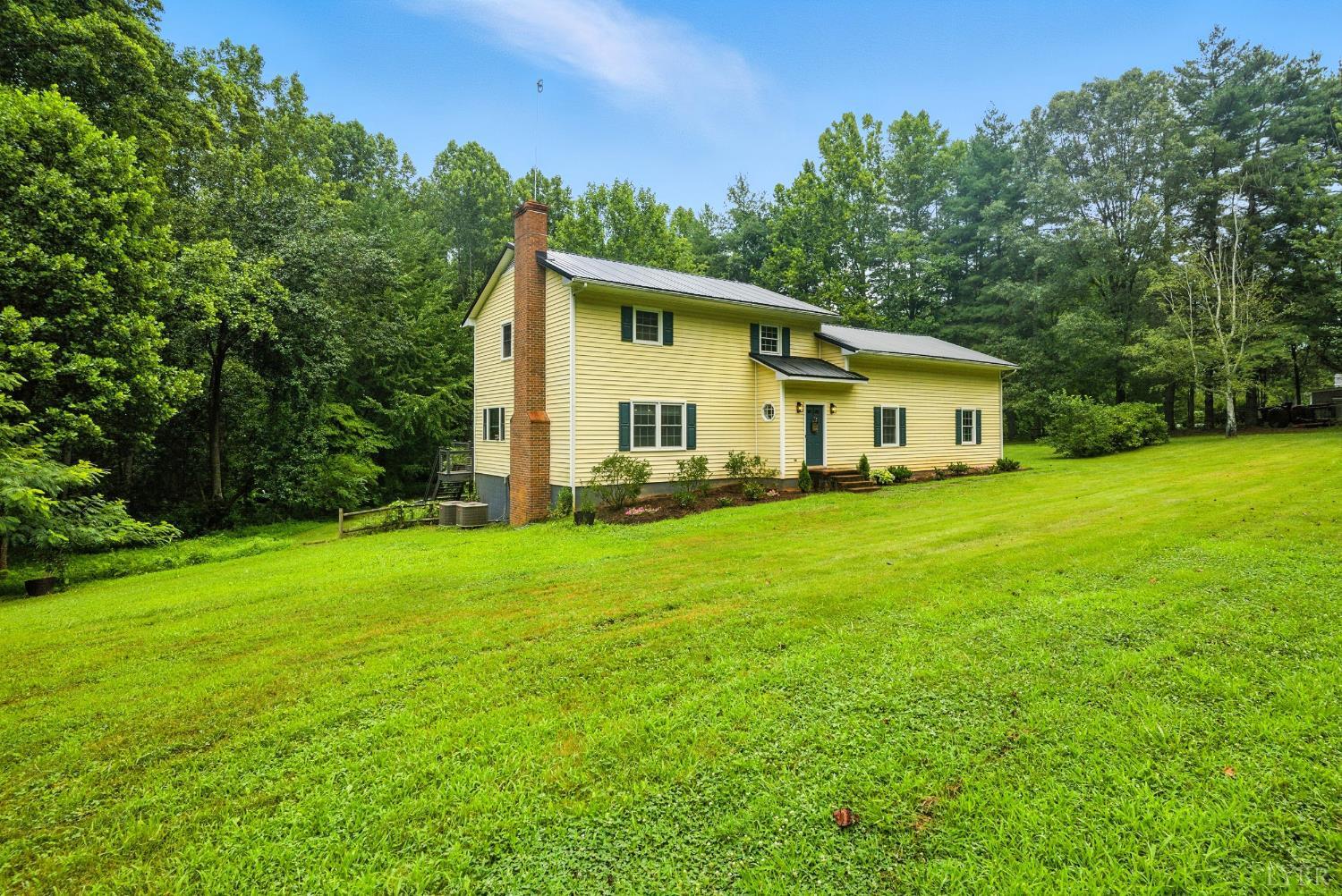 2078 Featherfin Road Prospect, VA 23960 - Photo 2 of 49 a view of a house with backyard and garden