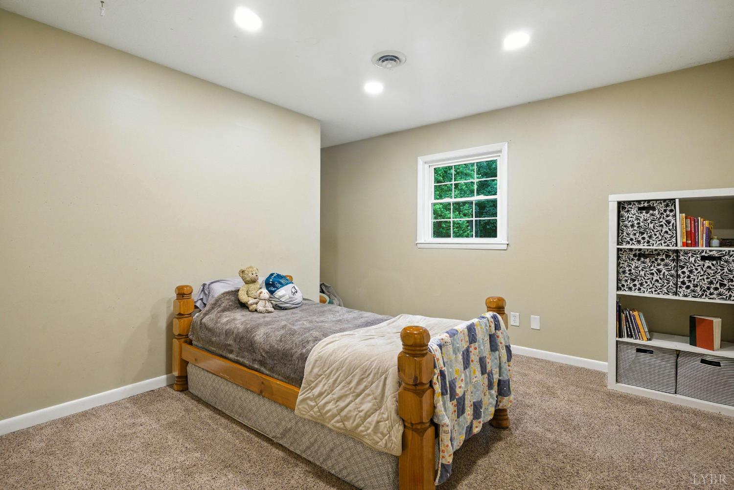 2078 Featherfin Road Prospect, VA 23960 - Photo 21 of 49 a bedroom with a bed and a table in it