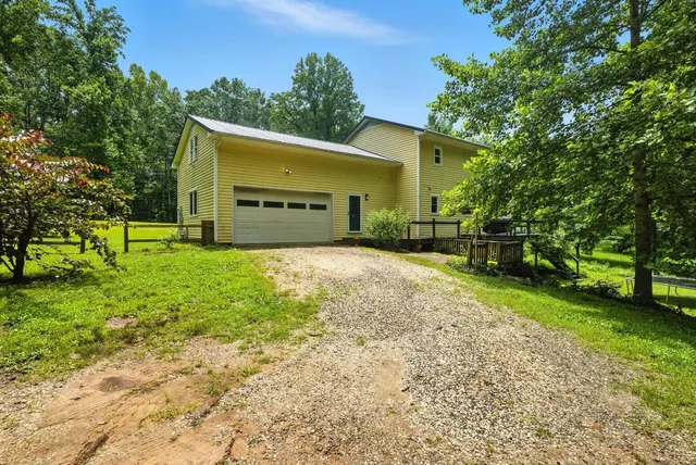 a front view of a house having yard
