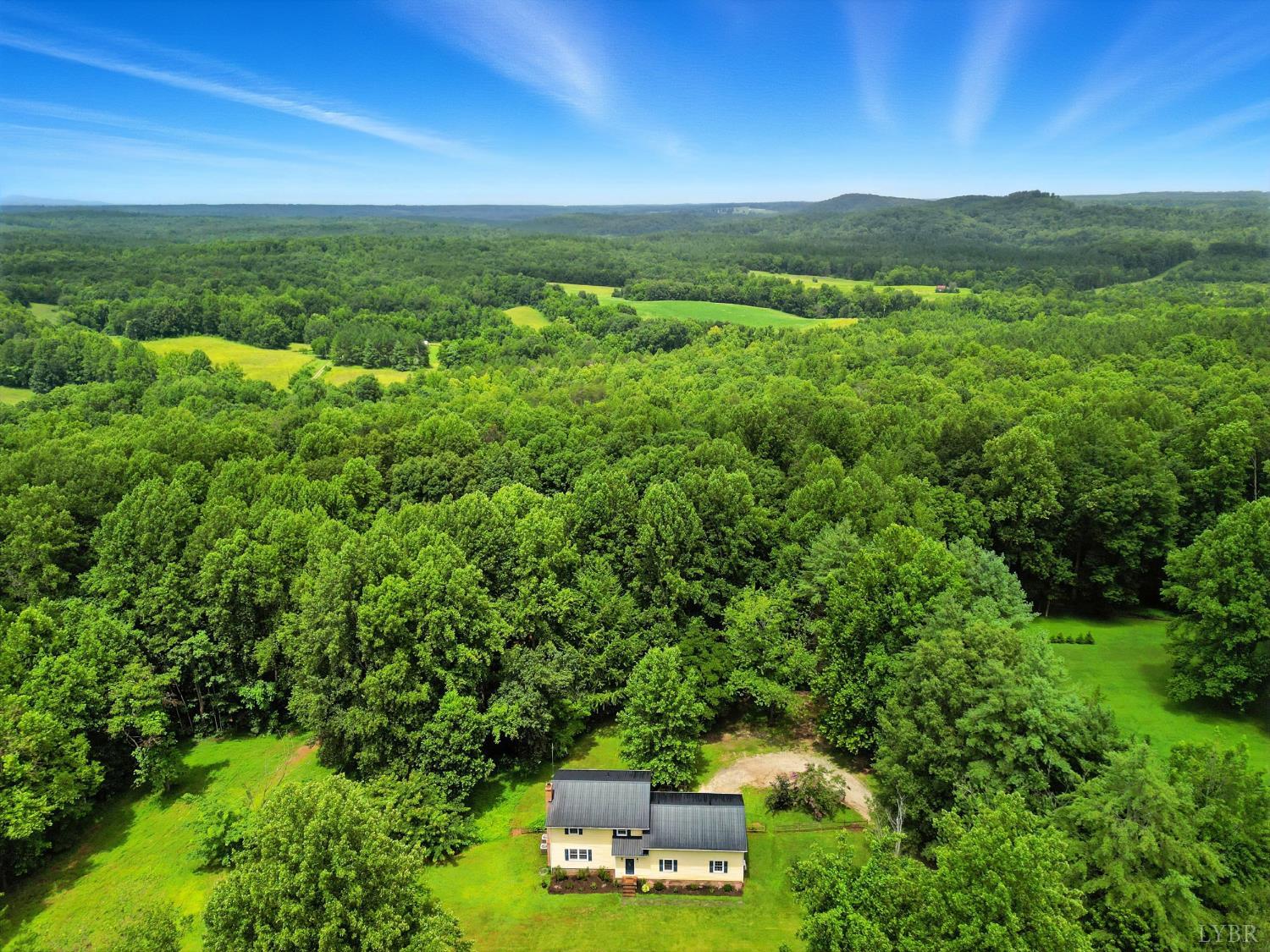 2078 Featherfin Road Prospect, VA 23960 - Photo 44 of 49 a view of a big yard with lots of green space and mountain view