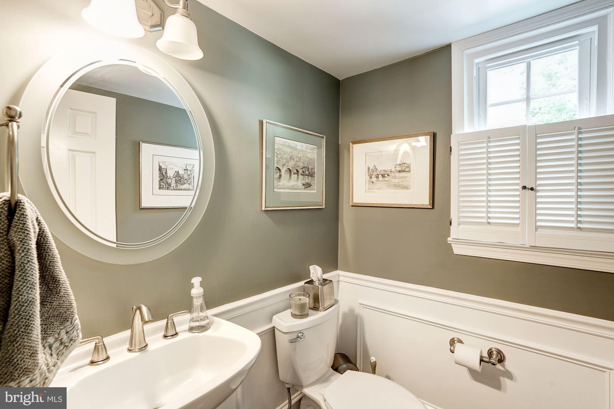 2104 Salt Kettle Way Reston, VA 20191 - Photo 11 of 29 a bathroom with a toilet a sink and mirror