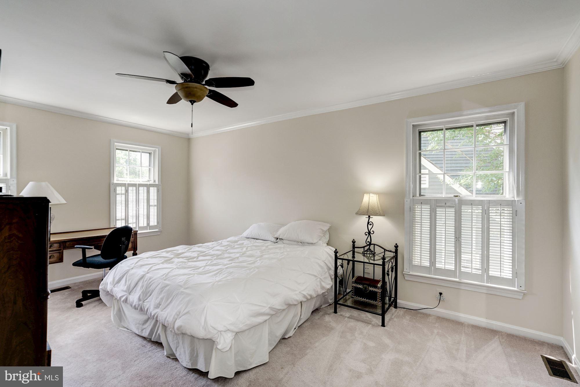 2104 Salt Kettle Way Reston, VA 20191 - Photo 12 of 29 a bedroom with a bed and a window
