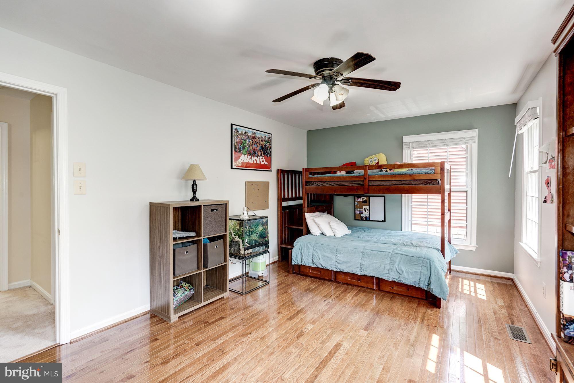 2104 Salt Kettle Way Reston, VA 20191 - Photo 15 of 29 a view of a livingroom with furniture and a ceiling fan
