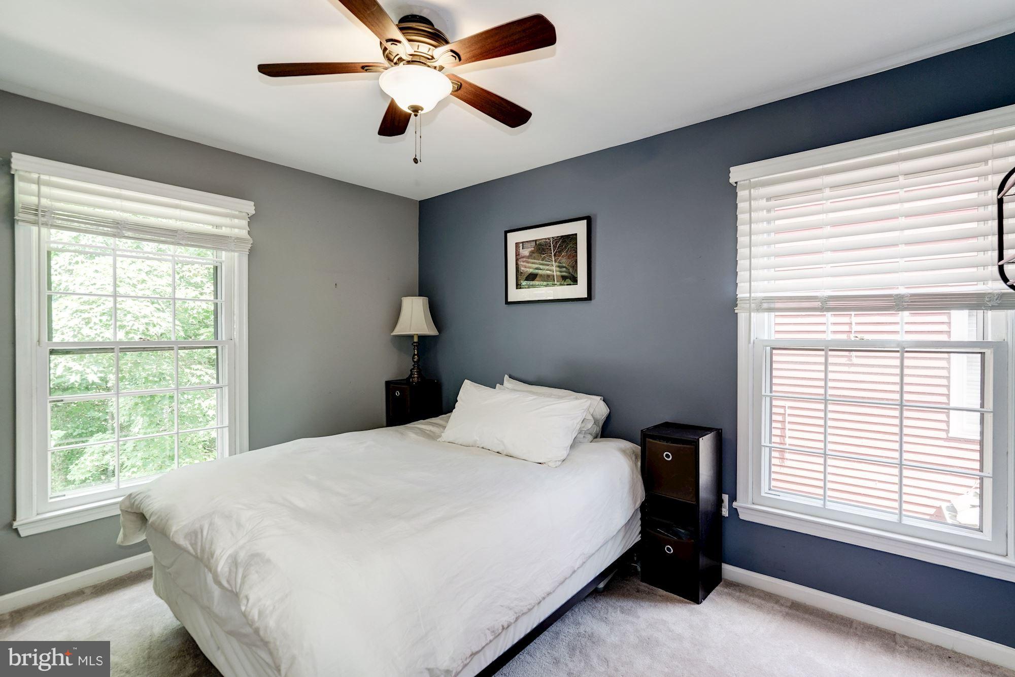 2104 Salt Kettle Way Reston, VA 20191 - Photo 18 of 29 a bedroom with a bed and a window