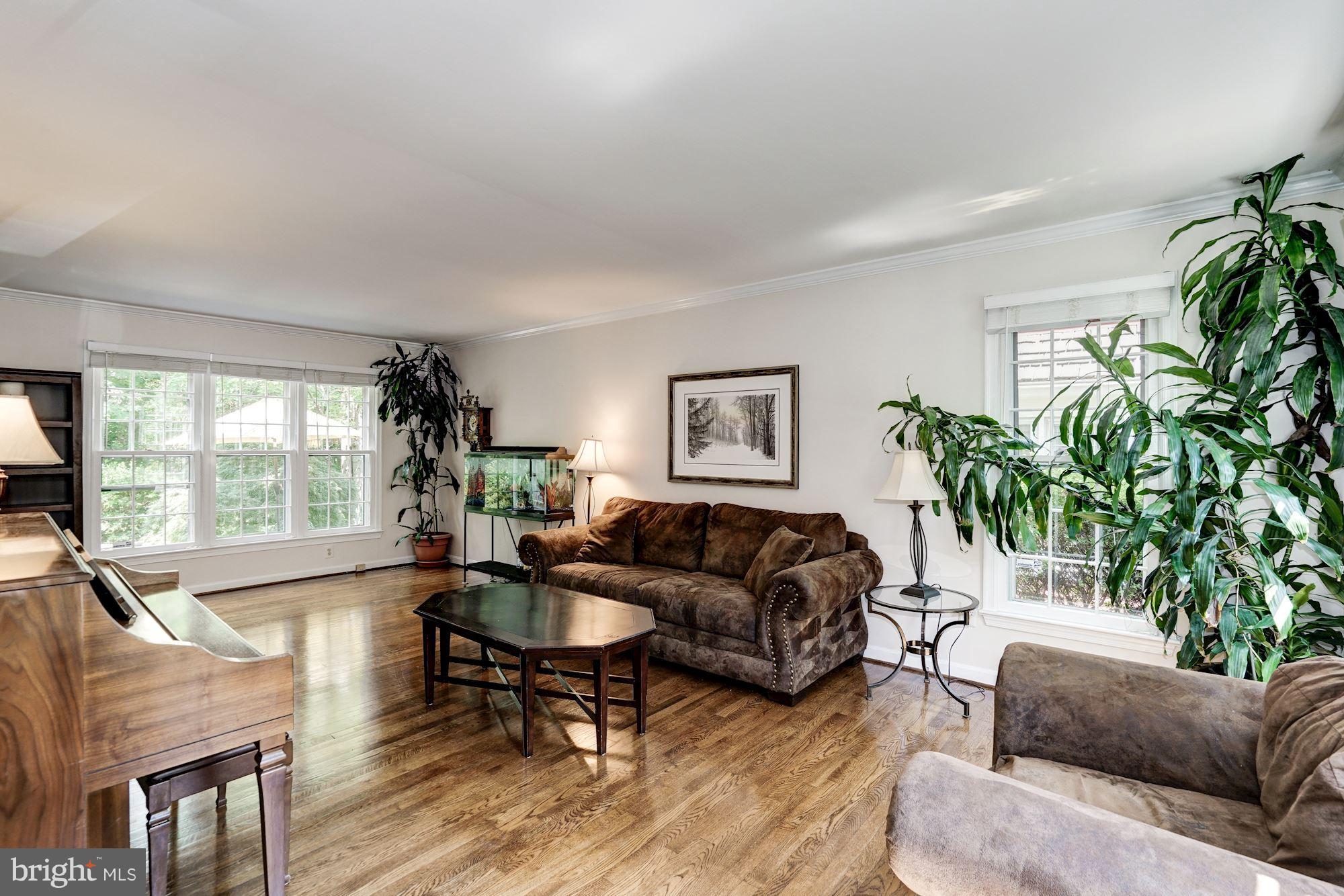 2104 Salt Kettle Way Reston, VA 20191 - Photo 3 of 29 a living room with furniture and a large window