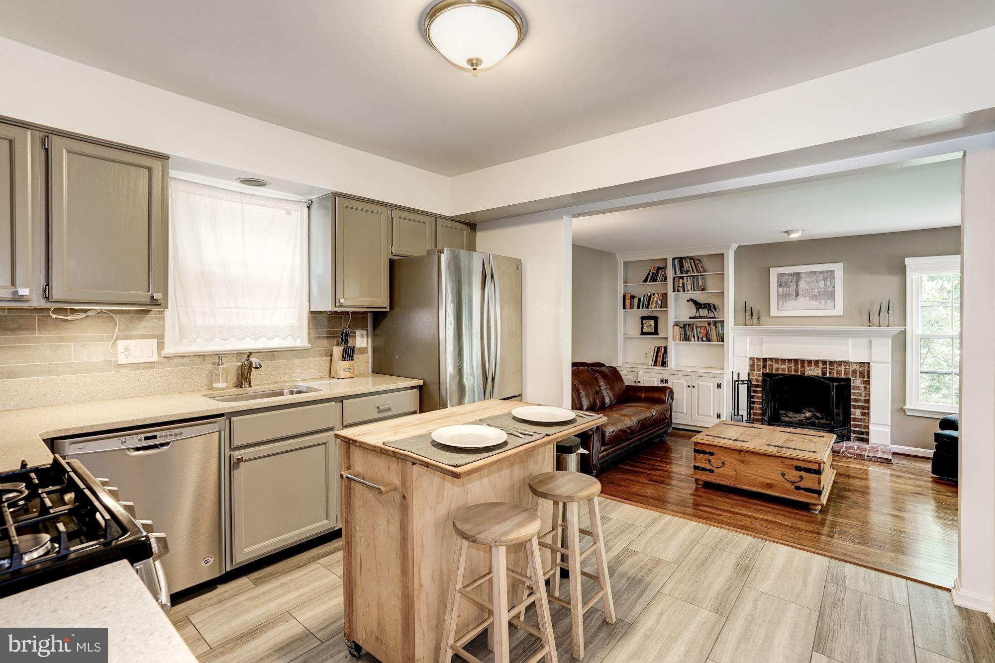 2104 Salt Kettle Way Reston, VA 20191 - Photo 8 of 29 a kitchen with a sink stove and refrigerator