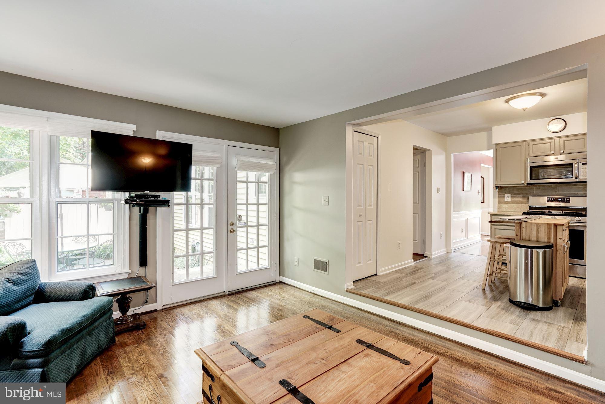 2104 Salt Kettle Way Reston, VA 20191 - Photo 9 of 29 a living room with furniture and a flat screen tv