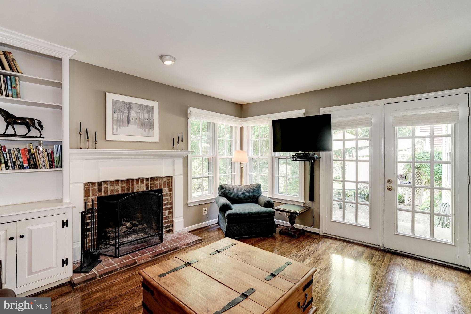 2104 Salt Kettle Way Reston, VA 20191 - Photo 10 of 29 a living room with furniture fireplace and flat screen tv