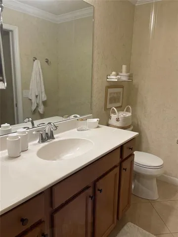 a bathroom with a shower and a sink