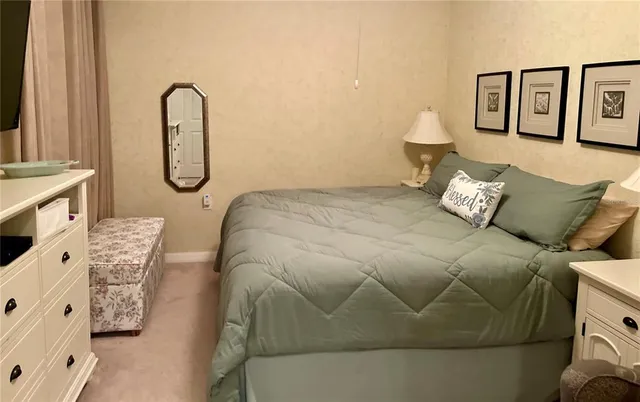 a bathroom with a sink vanity mirror and toilet
