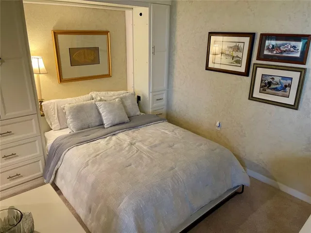a kitchen with a table and chairs