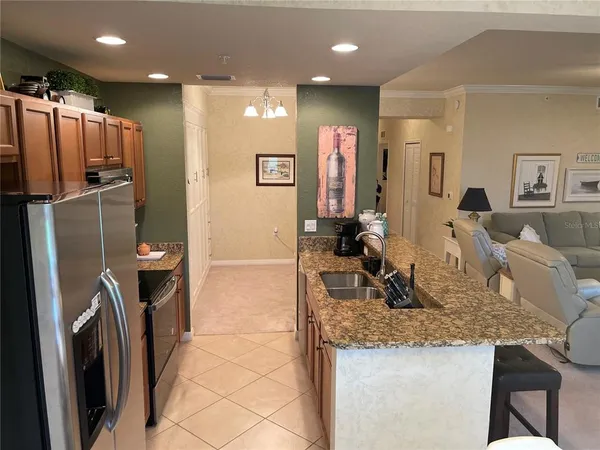 a bedroom with a bed and cabinets