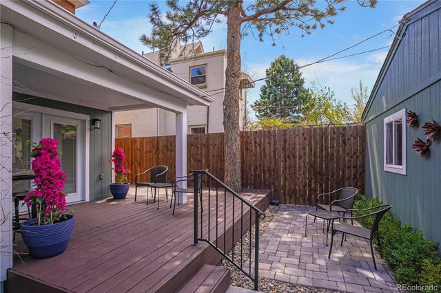 a view of a chairs and tables in patio