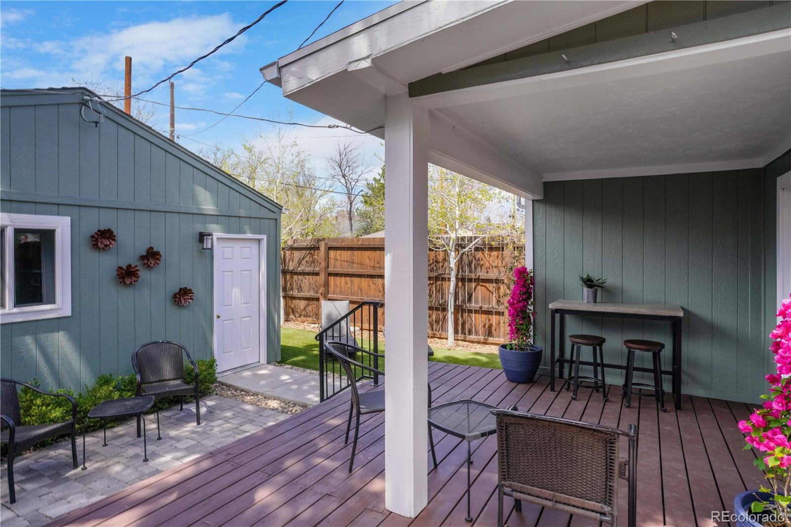 1283 Madison Street Denver, CO 80206 - Photo 32 of 34 a outdoor living space with furniture