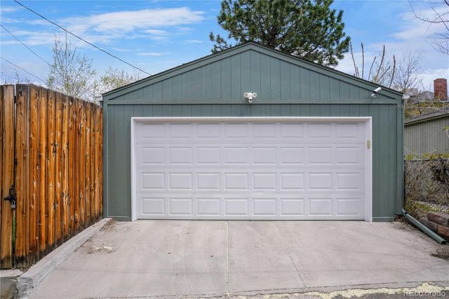 a front view of a house with a garage