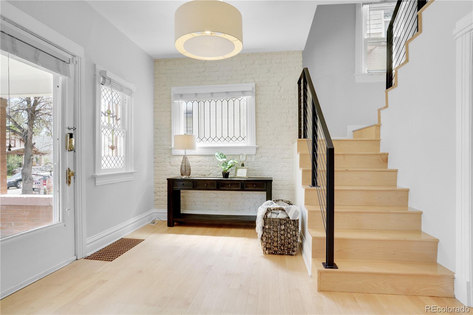 1283 Madison Street Denver, CO 80206 - Photo 4 of 34 a view of entryway and hall