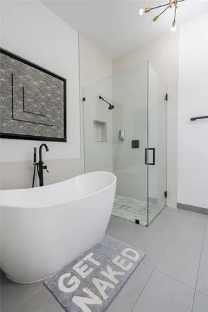 a view of a bathtub in a bathroom