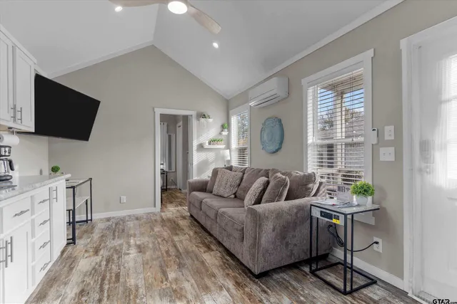 a kitchen with stainless steel appliances granite countertop a refrigerator sink and cabinets