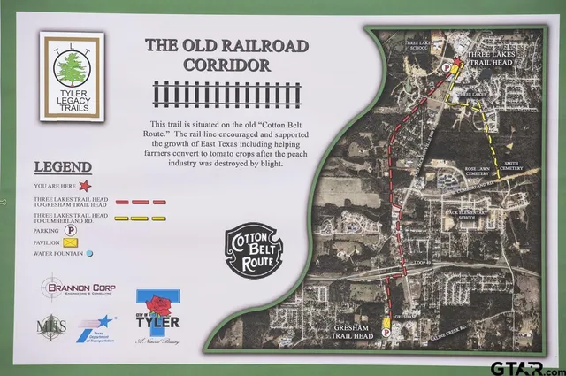 a view of a park with welcome board