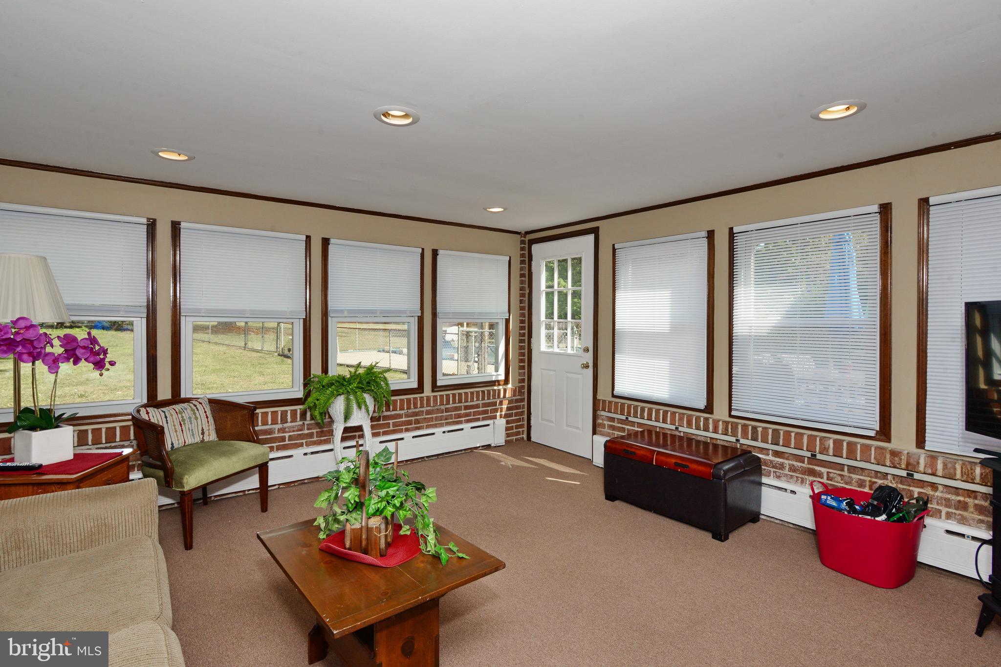 449 Landis Road Harleysville, PA 19438 - Photo 15 of 46 Sun Room with Access to Rear Yard & Pool