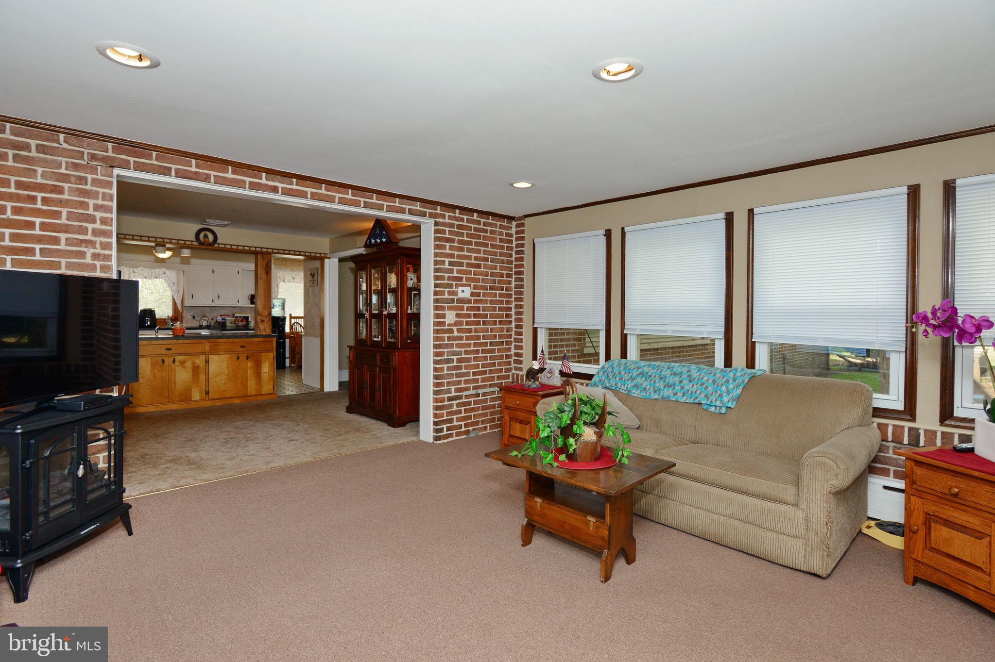 449 Landis Road Harleysville, PA 19438 - Photo 17 of 46 Sun Room is open to the Living Room