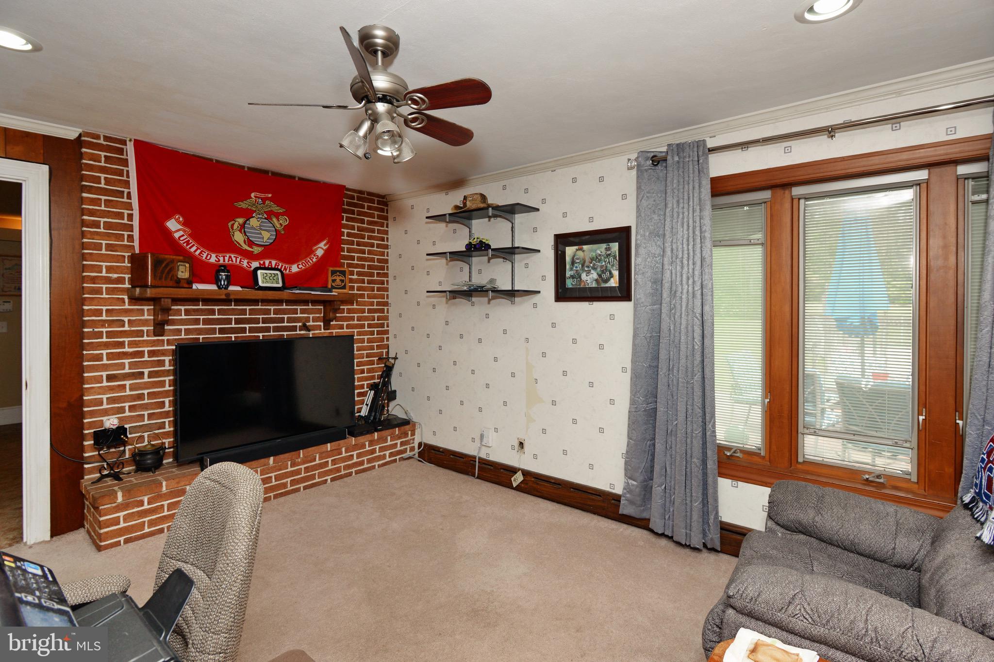 449 Landis Road Harleysville, PA 19438 - Photo 18 of 46 Home Office or Den with Brick Fireplace
