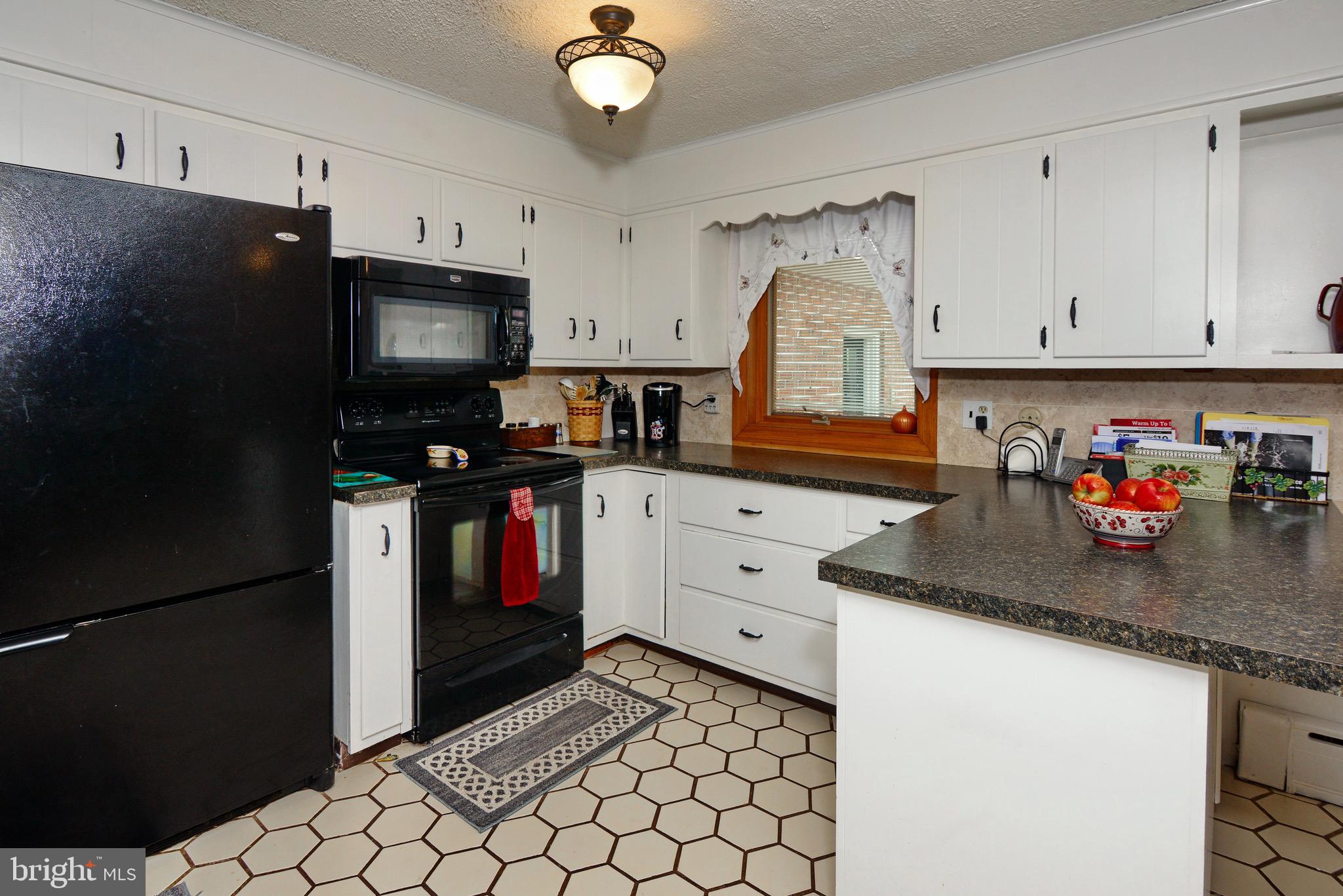 449 Landis Road Harleysville, PA 19438 - Photo 9 of 46 Kitchen with Honeycomb Tile Floor