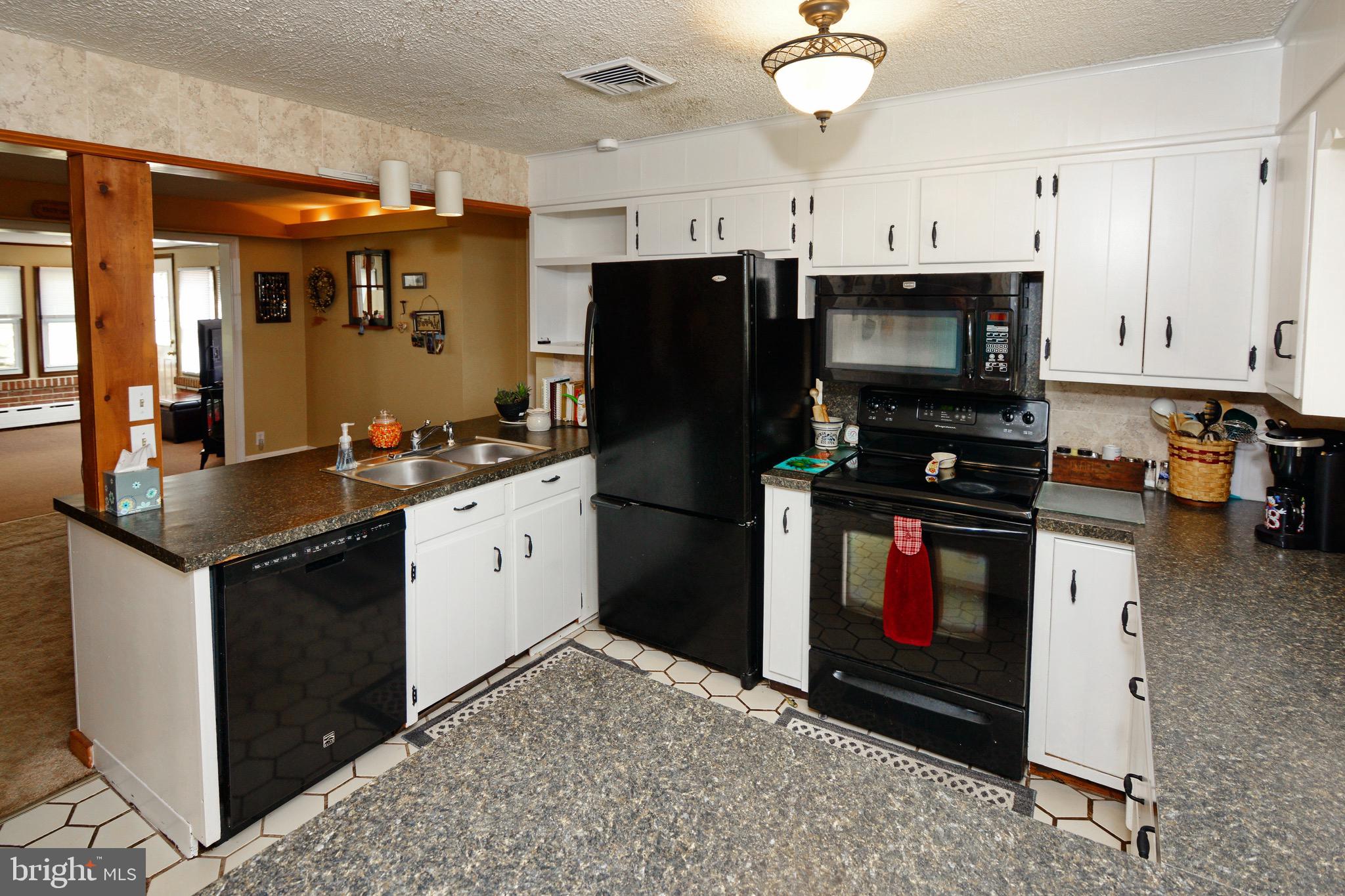 449 Landis Road Harleysville, PA 19438 - Photo 10 of 46 Kitchen Open to Dining Room