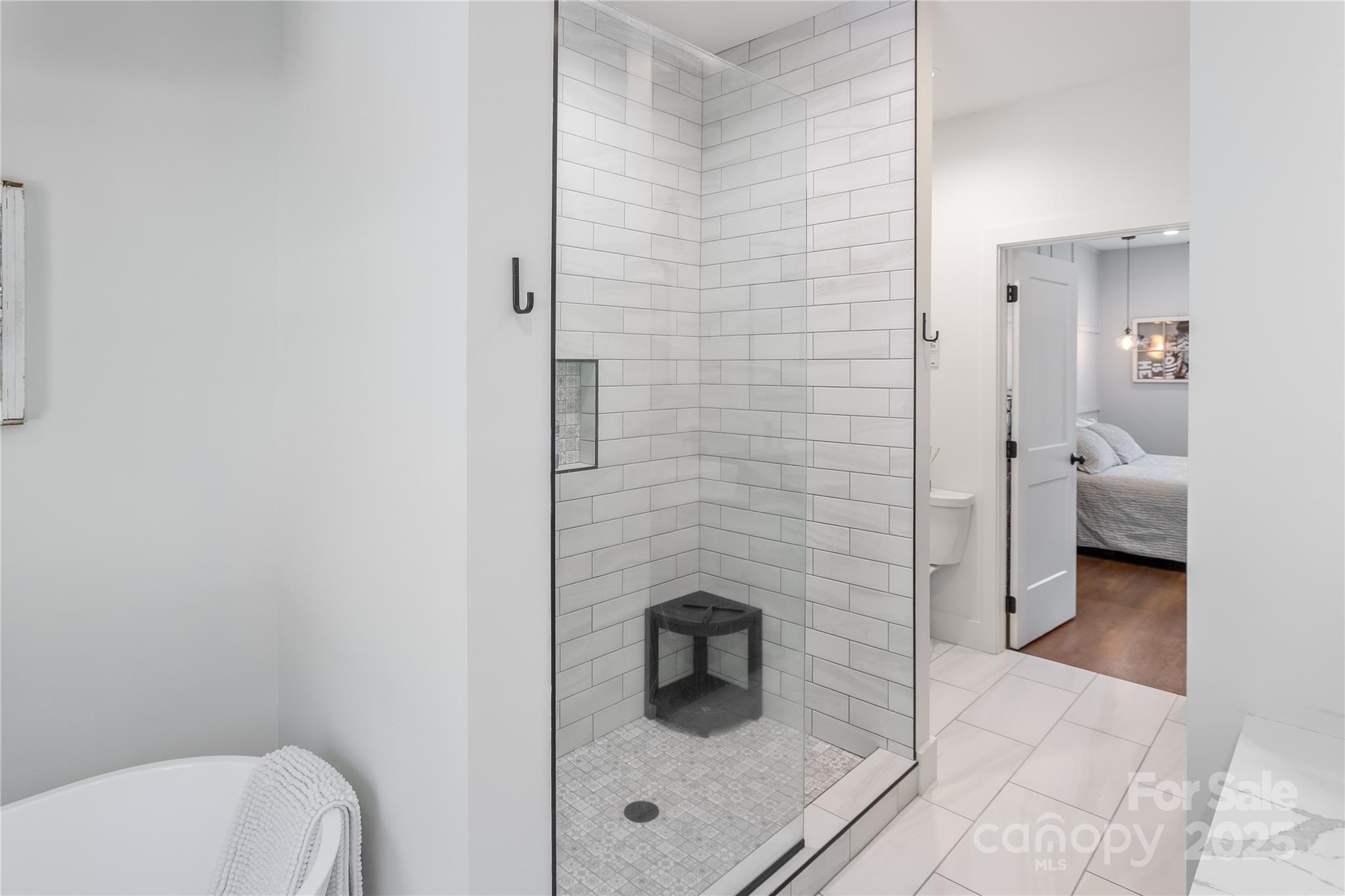 100 Kinloch Lane Clyde, NC 28721 - Photo 17 of 39 a bathroom with a toilet and a shower