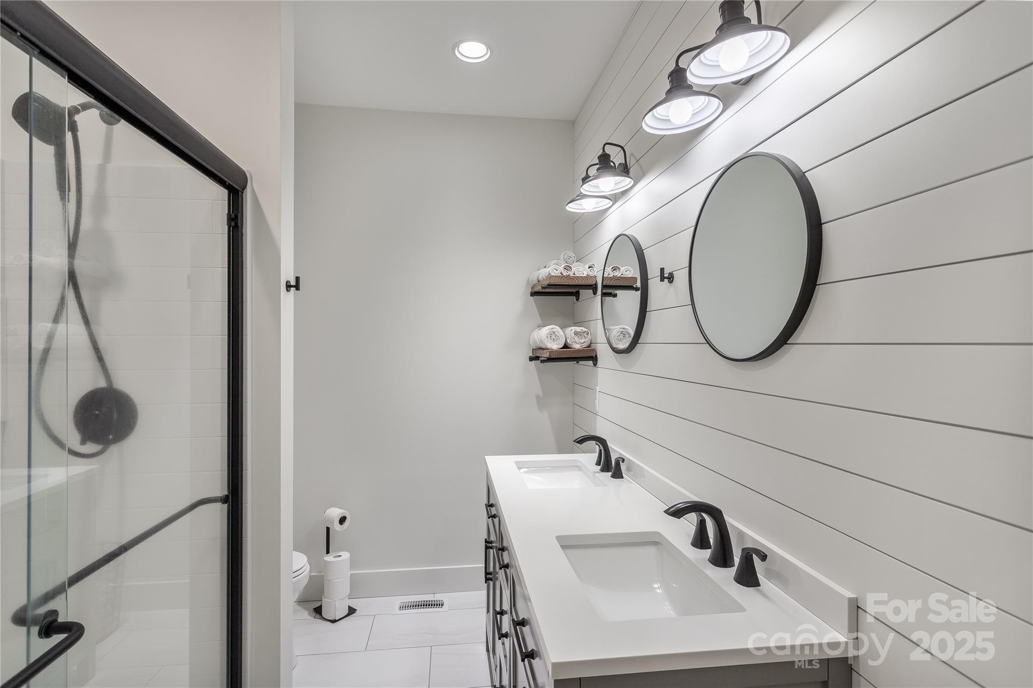 100 Kinloch Lane Clyde, NC 28721 - Photo 22 of 39 a bathroom with a sink and mirror