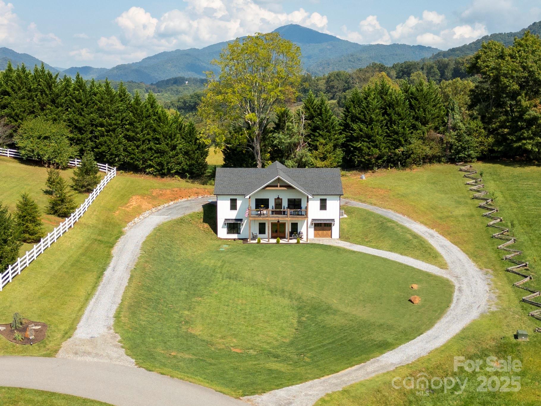 100 Kinloch Lane Clyde, NC 28721 - Photo 36 of 39 a view of a swimming pool with a yard
