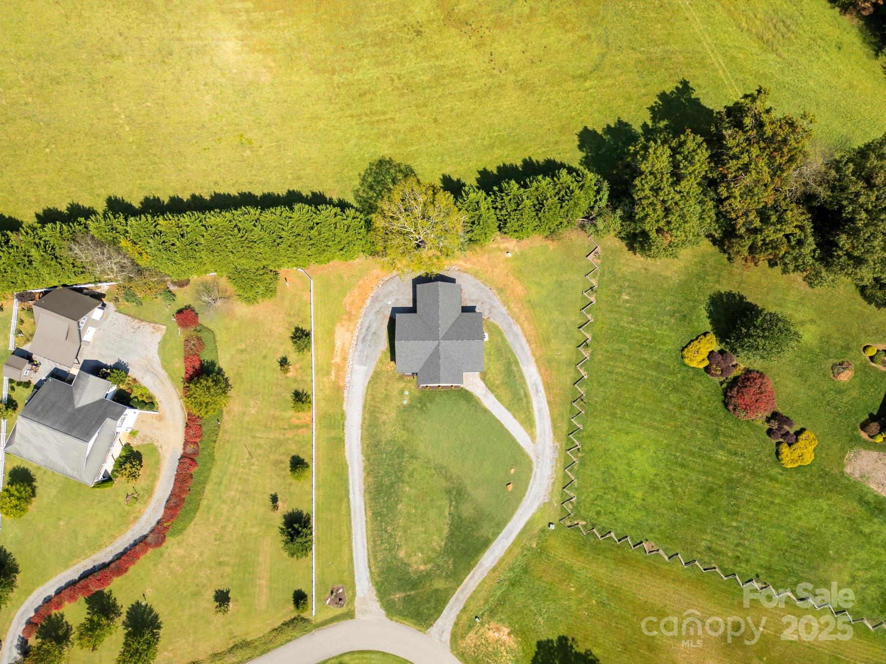100 Kinloch Lane Clyde, NC 28721 - Photo 38 of 39 an aerial view of a swimming pool with a lake view