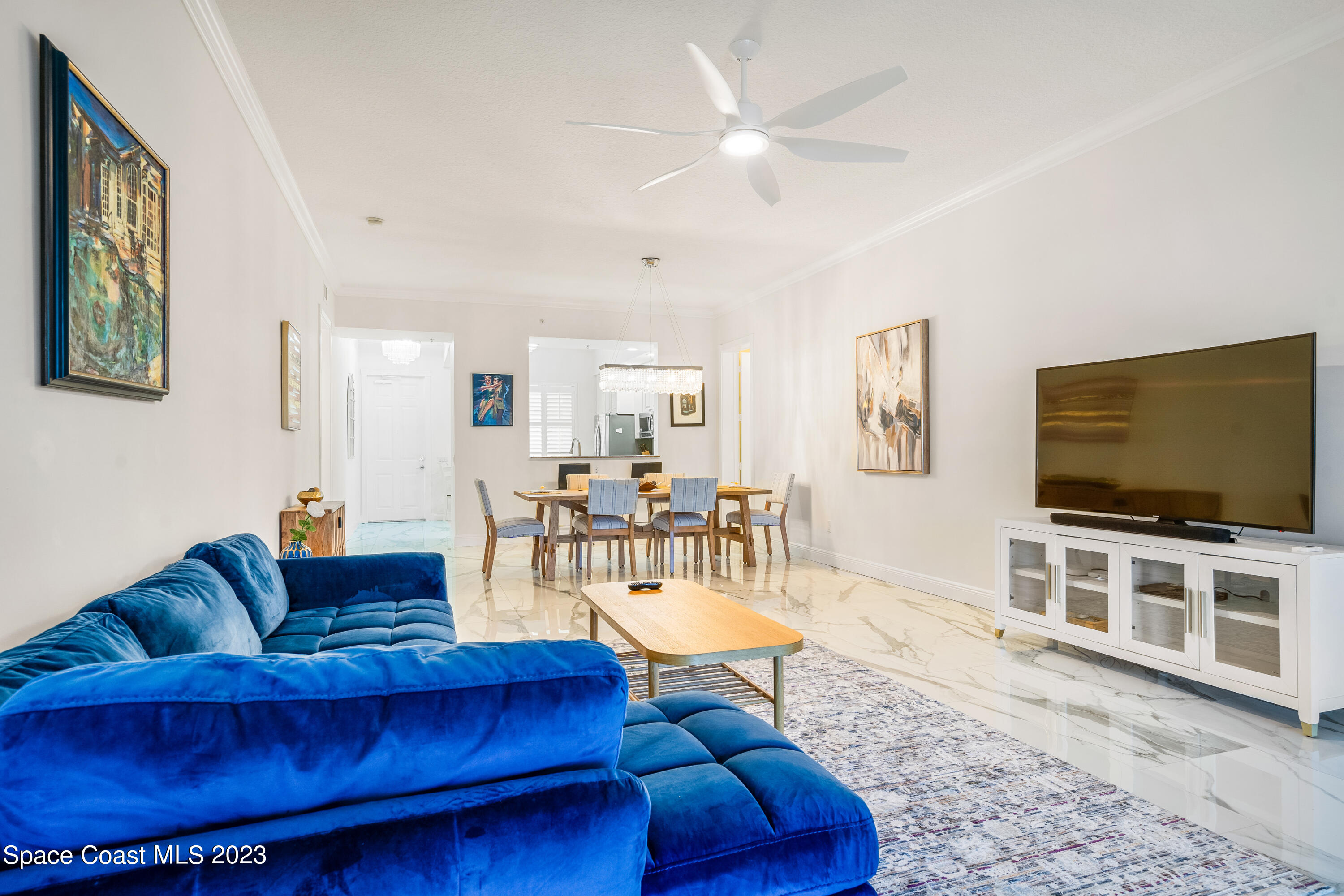 Undisclosed Address Fort Pierce, FL 34949 - Photo 14 of 36 a living room with furniture and a flat screen tv