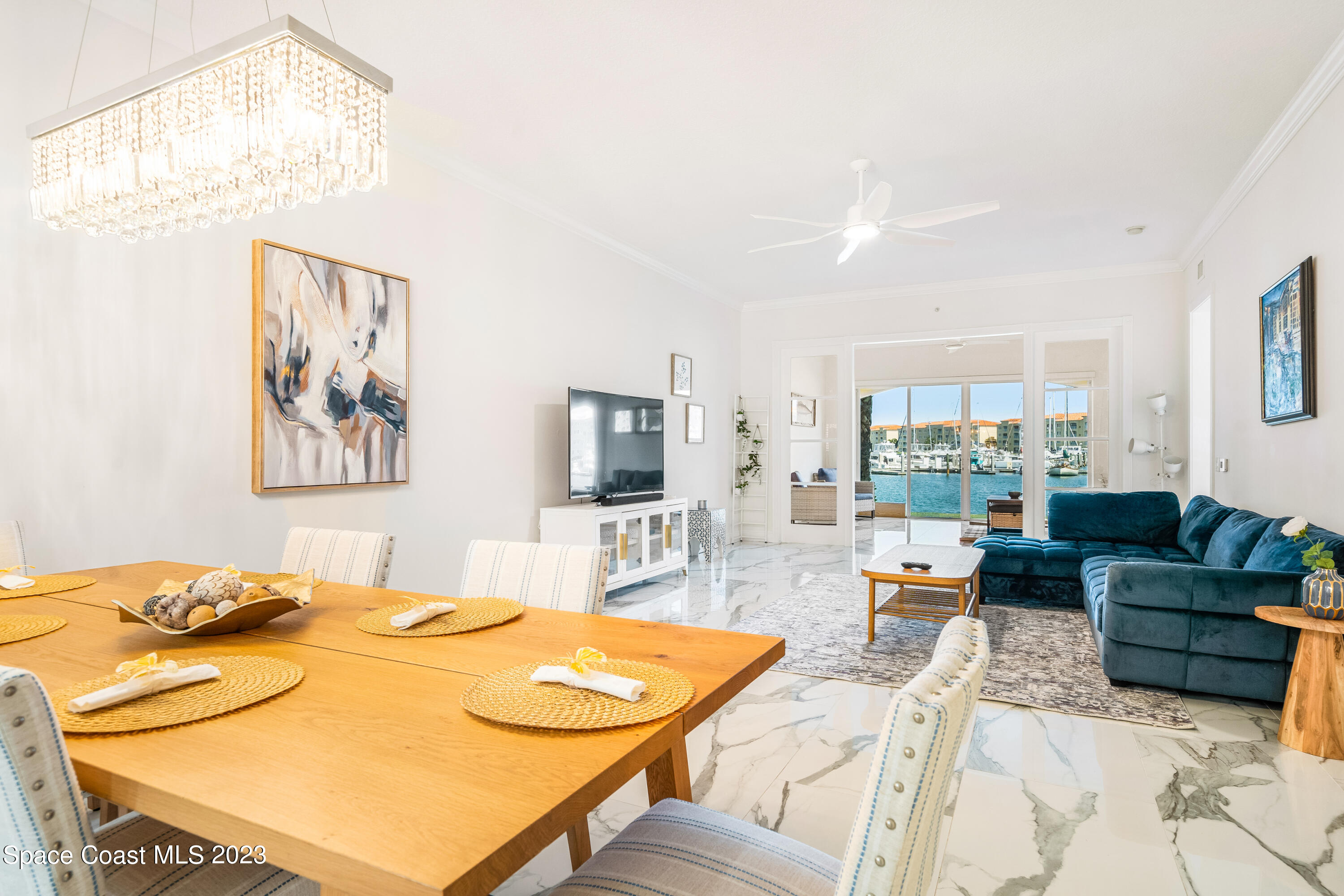 Undisclosed Address Fort Pierce, FL 34949 - Photo 15 of 36 a living room with furniture and a flat screen tv