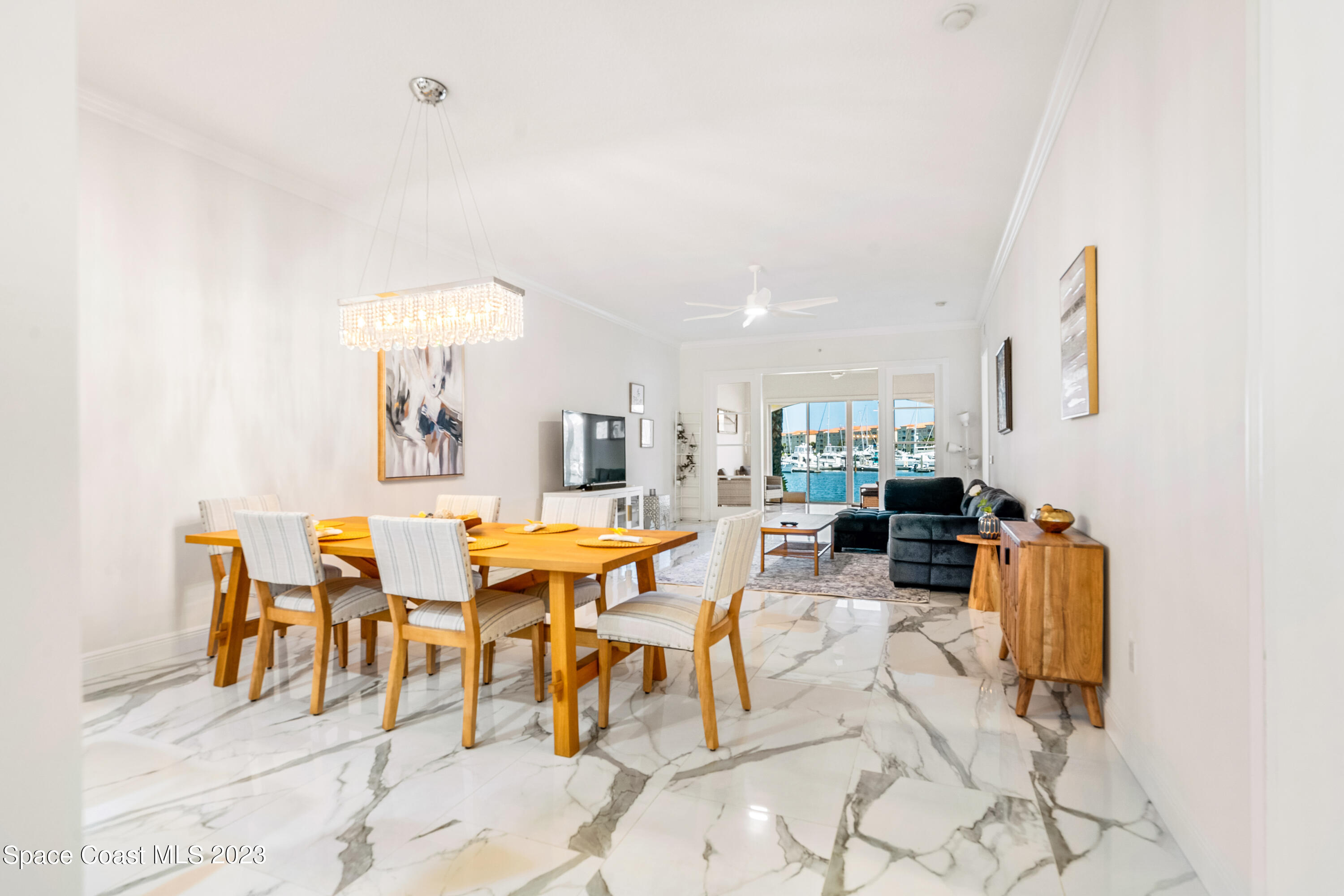 Undisclosed Address Fort Pierce, FL 34949 - Photo 17 of 36 a living room with lots of furniture and a painting on the wall