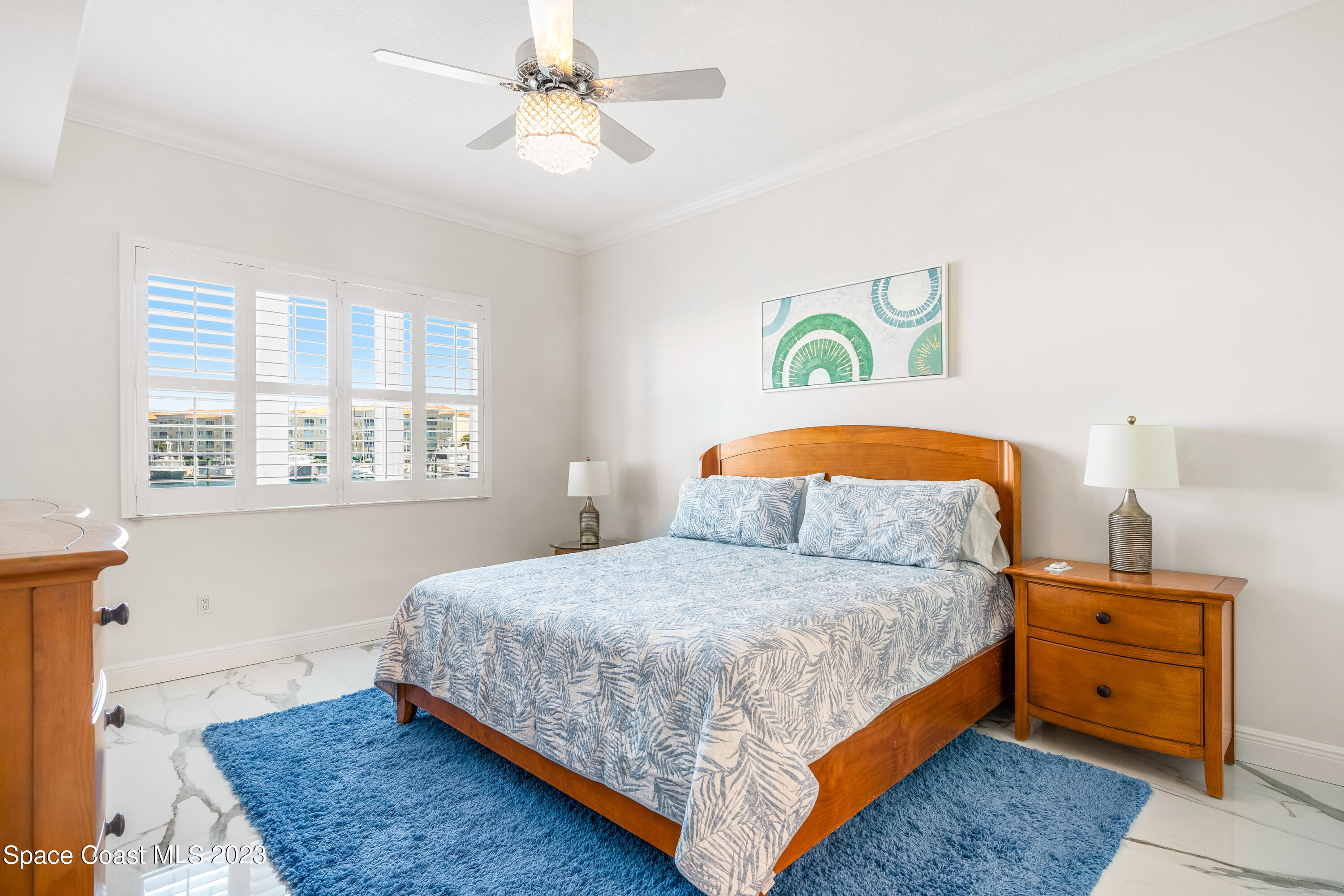 Undisclosed Address Fort Pierce, FL 34949 - Photo 18 of 36 a bedroom with a bed and window