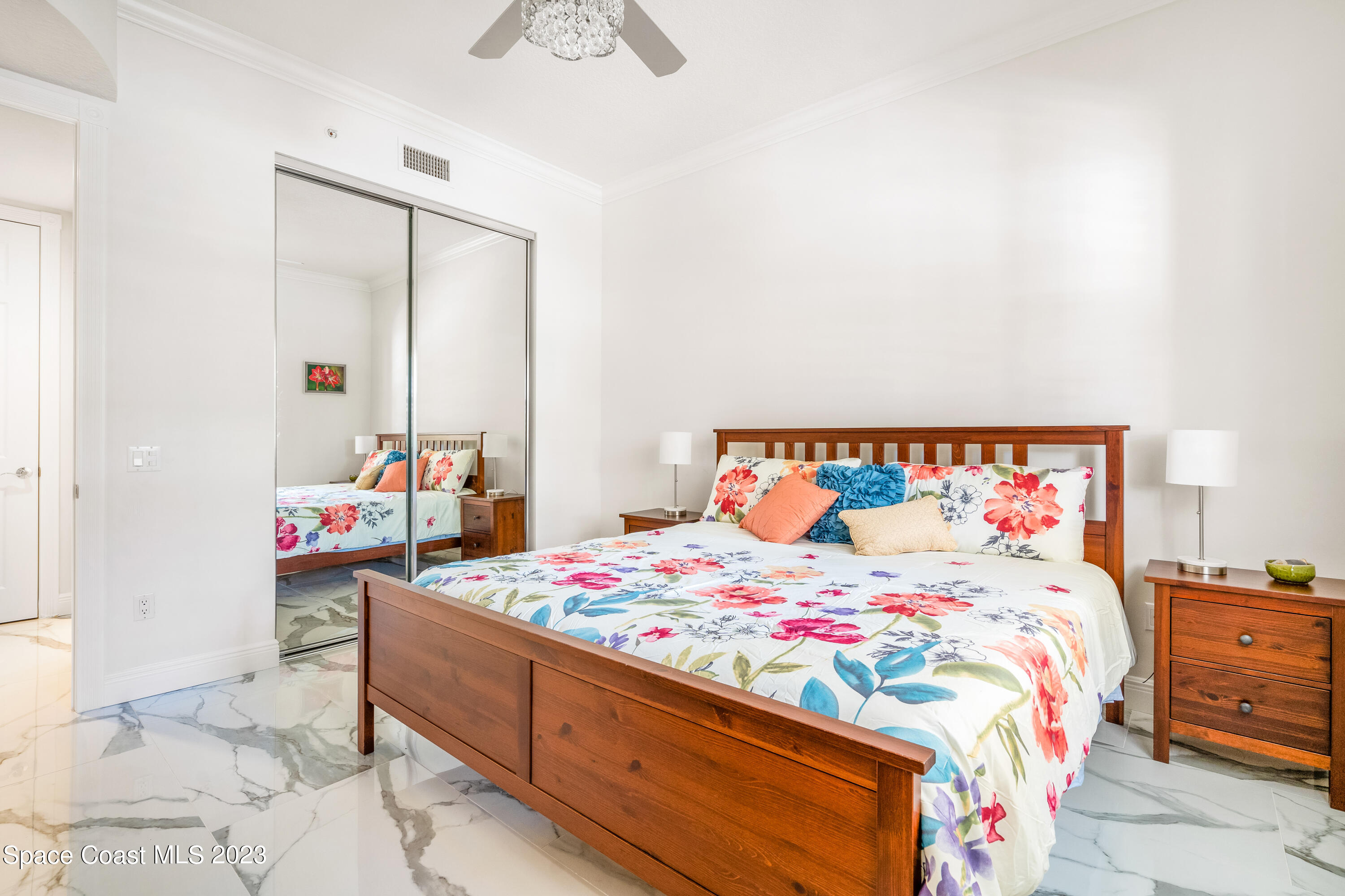 Undisclosed Address Fort Pierce, FL 34949 - Photo 24 of 36 a bedroom with a bed and a dresser