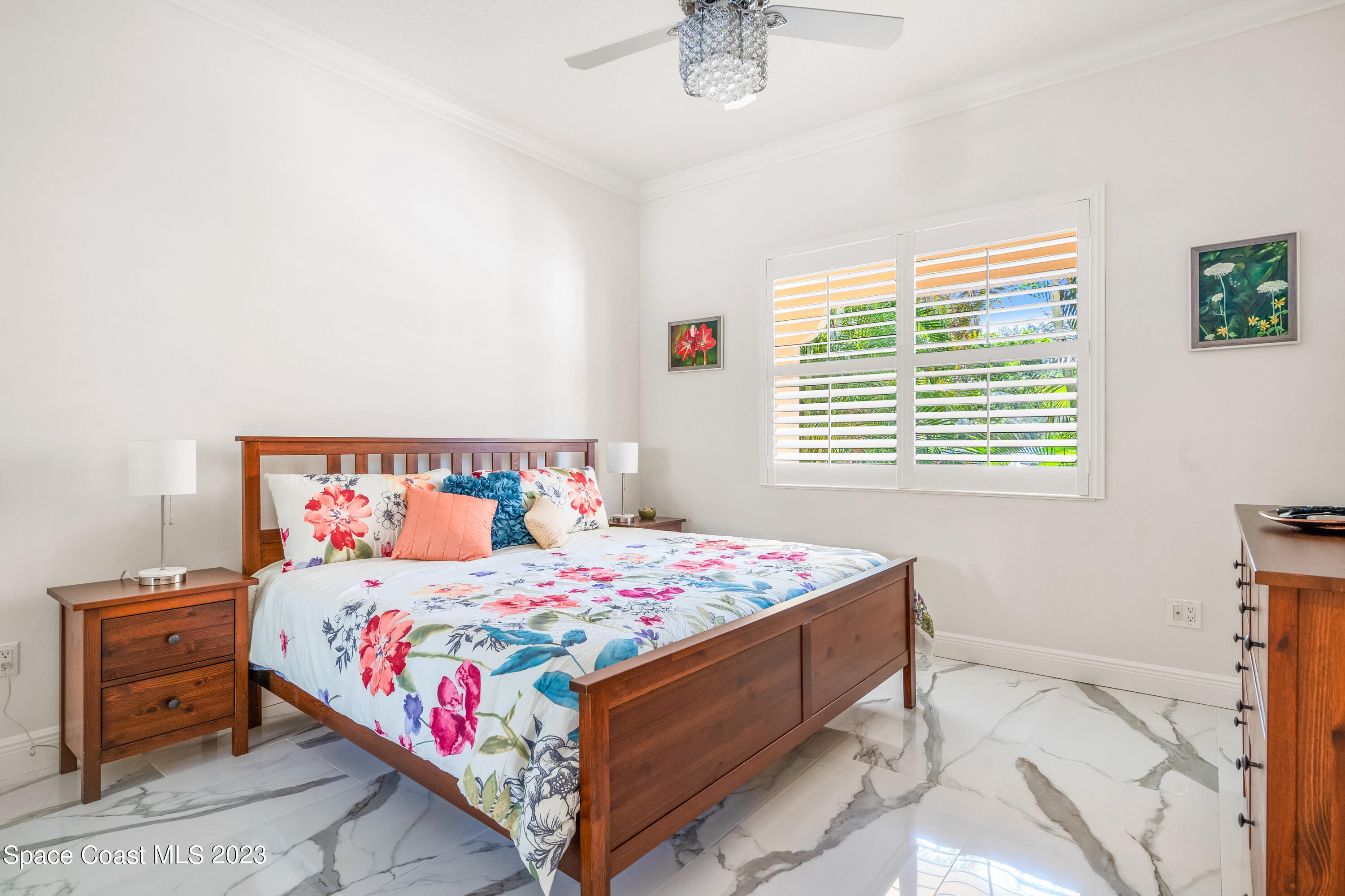 Undisclosed Address Fort Pierce, FL 34949 - Photo 25 of 36 a bedroom with a bed and a window