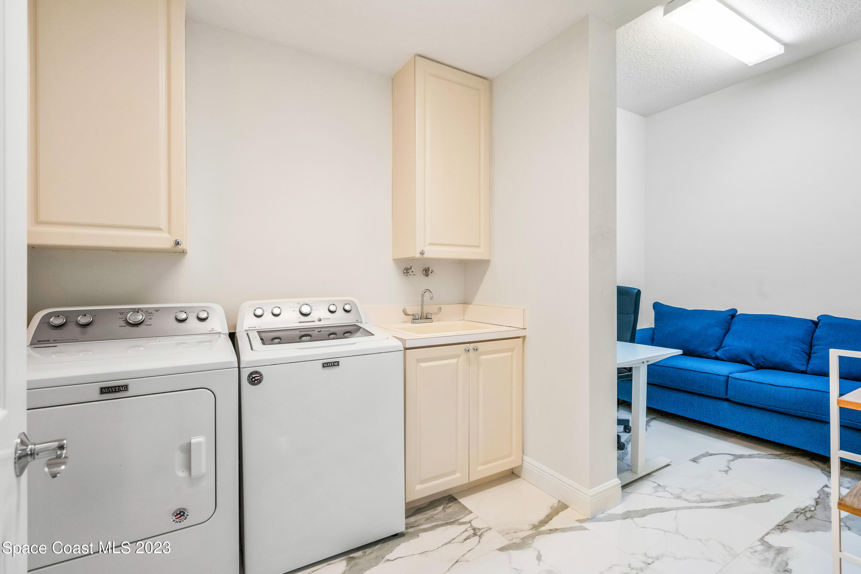 Undisclosed Address Fort Pierce, FL 34949 - Photo 27 of 36 a view of storage and utility room with washer and dryer