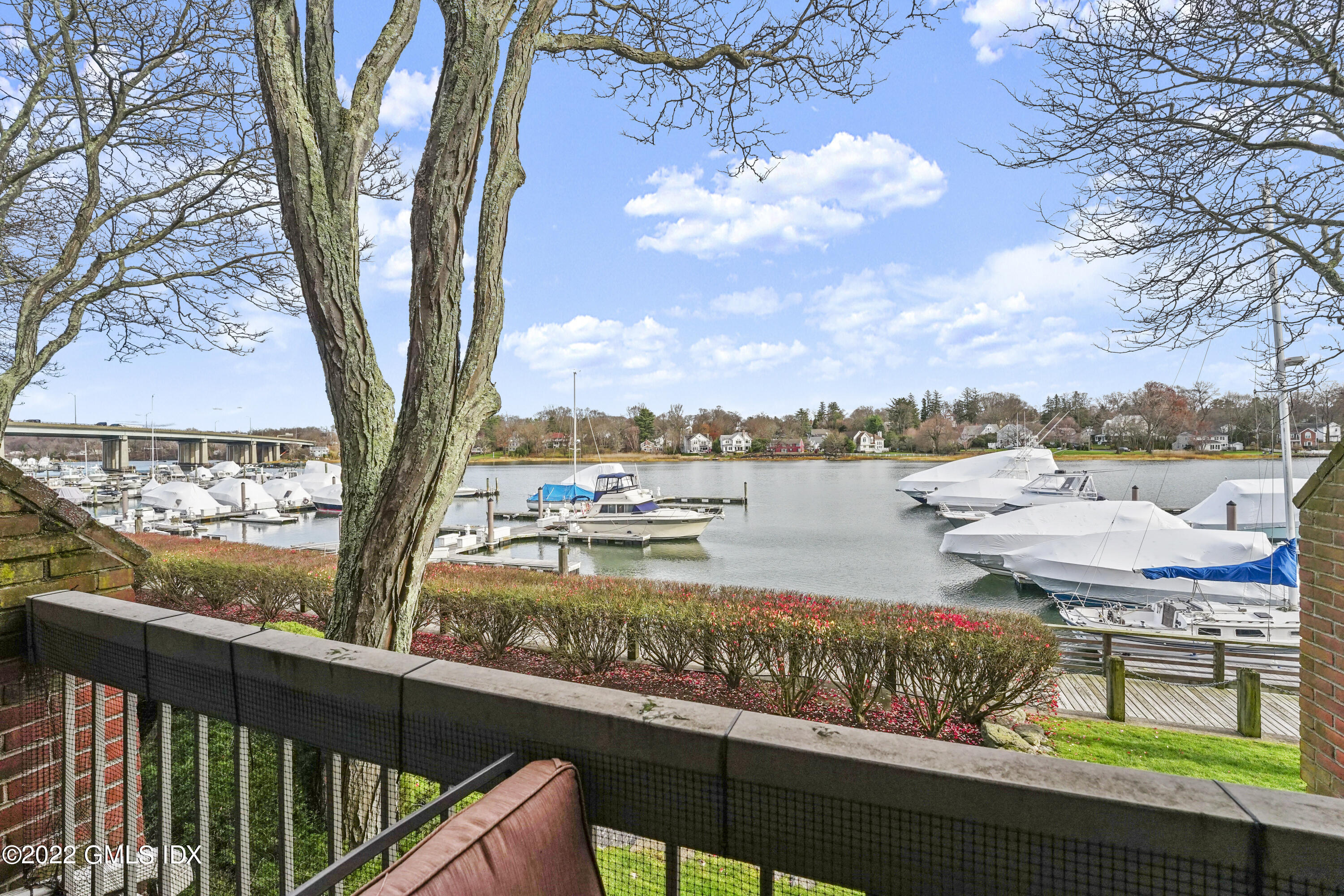 15 River Road, Unit 211 Cos Cob, CT 06807 - Photo 15 of 21 a view of a lake with a mountain view