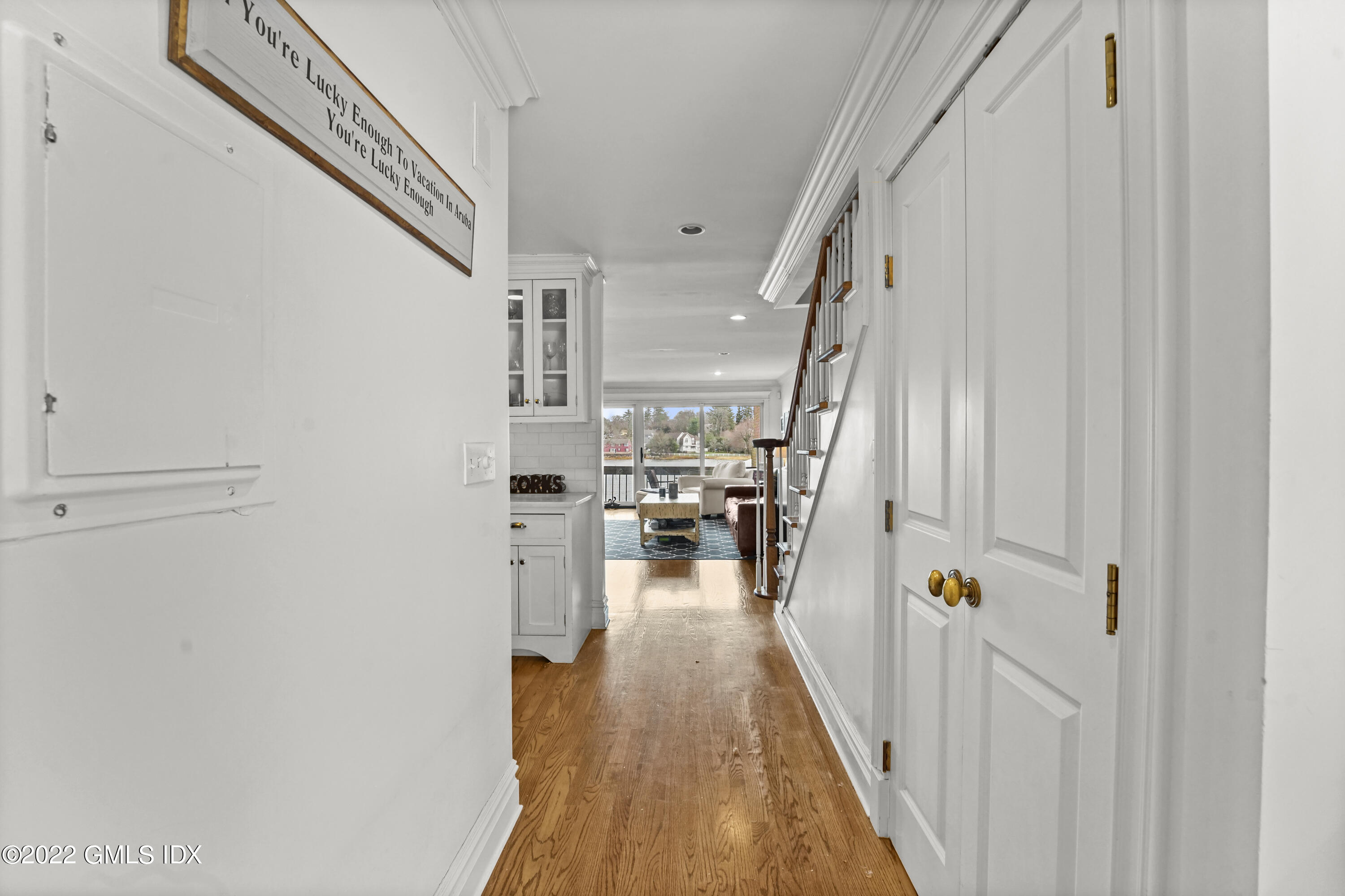 15 River Road, Unit 211 Cos Cob, CT 06807 - Photo 7 of 21 a view of a living room and entryway