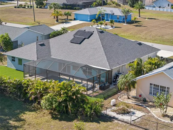 a view of multiple houses with outdoor space