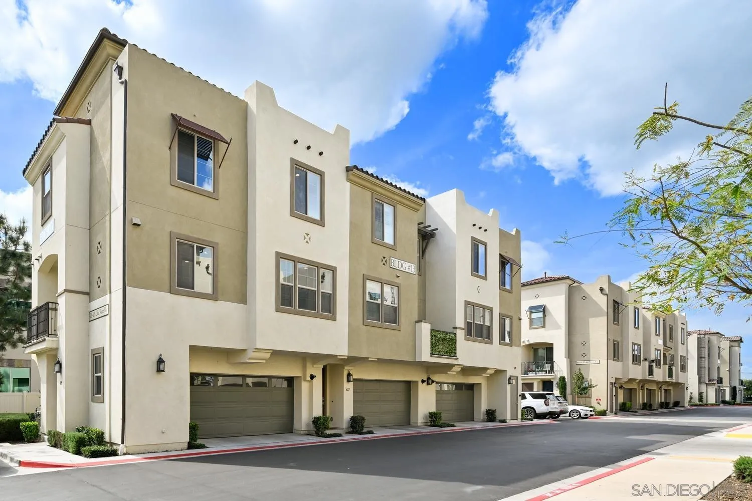 429 Lake Shore Way Santee, CA 92071 - Photo 20 of 26 a city street lined with buildings and cars