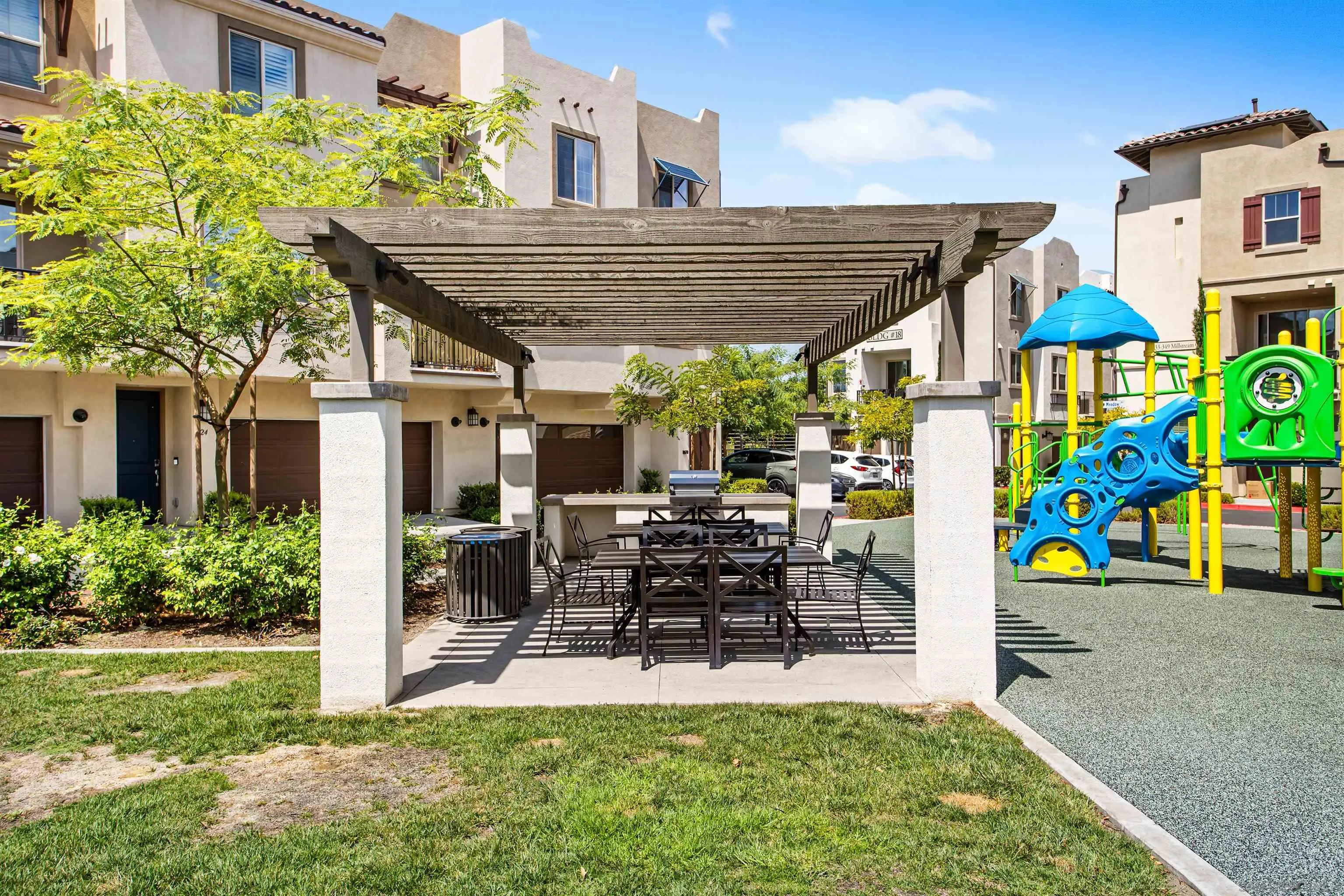 429 Lake Shore Way Santee, CA 92071 - Photo 26 of 26 a view of a patio with table and chairs potted plants and a large tree