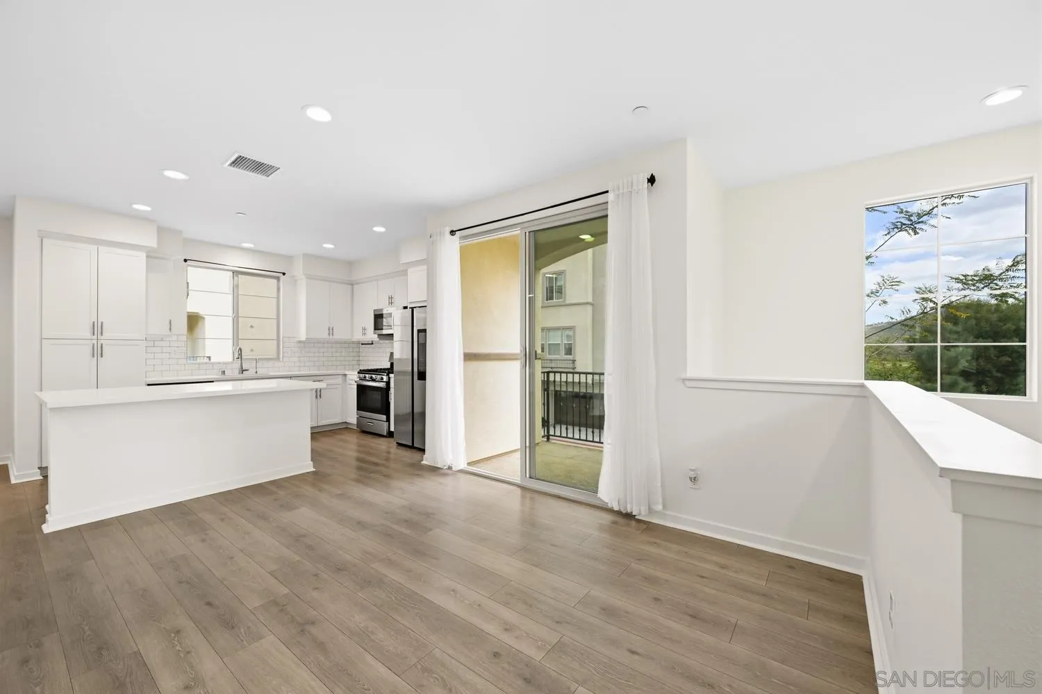429 Lake Shore Way Santee, CA 92071 - Photo 9 of 26 a view of kitchen with wooden floor